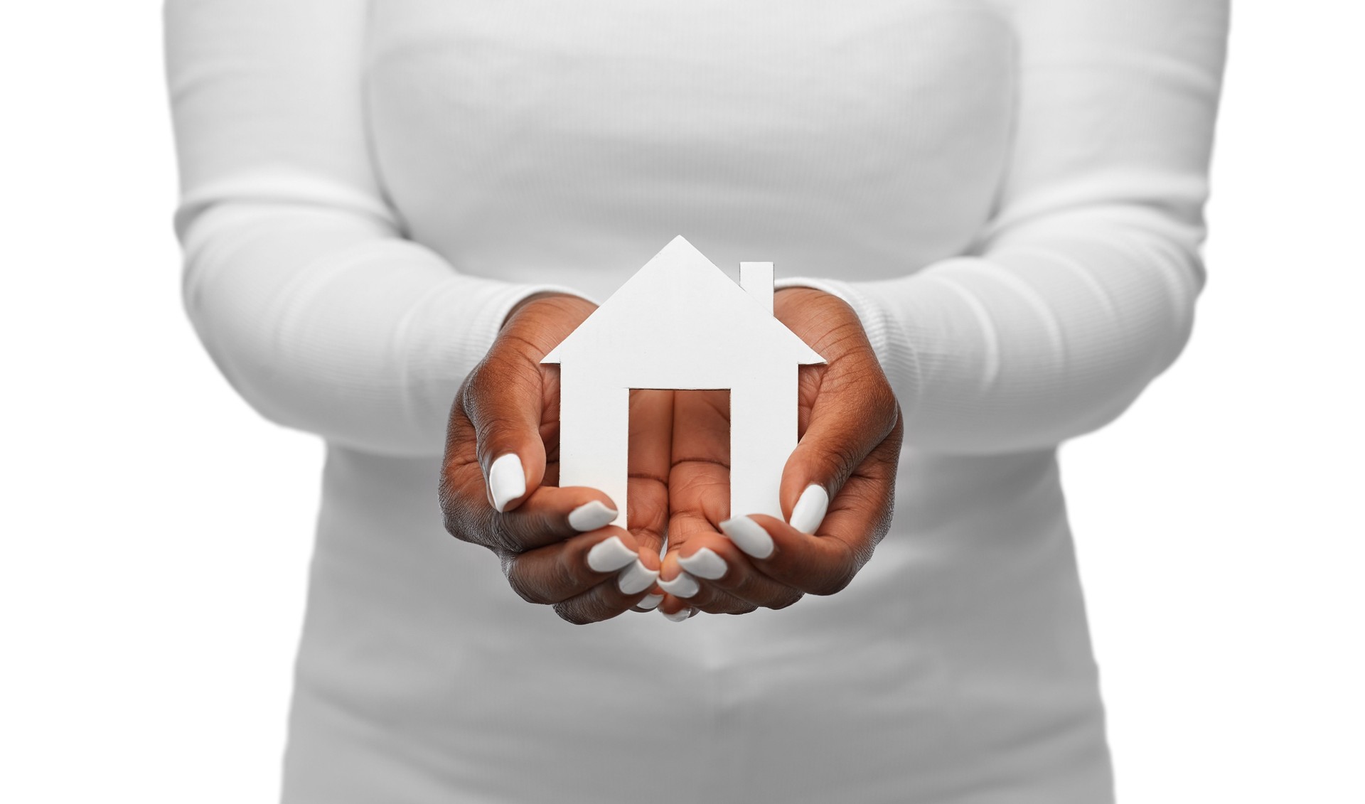 hands of african american woman holding house