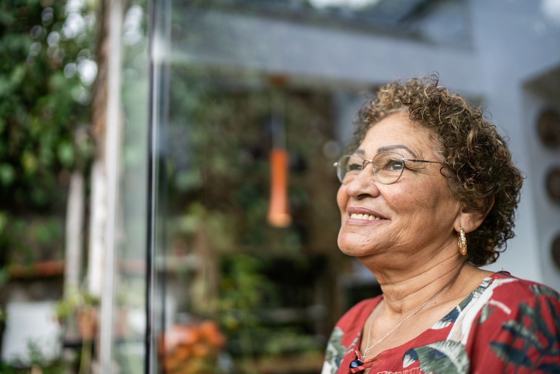 Senior woman contemplating at home